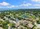 Home with pool, patio, and beautiful green trees near local waterway at 218 N Bay Hills Blvd, Safety Harbor, FL 34695