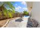 Relaxing backyard with patio, table, chairs, and a private in-ground pool at 218 N Bay Hills Blvd, Safety Harbor, FL 34695