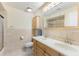 Bathroom featuring a double vanity and tiled walls at 218 N Bay Hills Blvd, Safety Harbor, FL 34695
