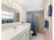 Bathroom with shower and single vanity sink at 218 N Bay Hills Blvd, Safety Harbor, FL 34695