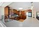 Well-equipped kitchen boasting ample cabinetry, stainless steel appliances, and a convenient island for meal preparation at 218 N Bay Hills Blvd, Safety Harbor, FL 34695