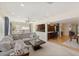 Open-concept living area with kitchen view, complete with stylish furnishings at 218 N Bay Hills Blvd, Safety Harbor, FL 34695