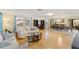 Bright and airy living room seamlessly connecting to the dining area, perfect for gatherings and entertaining at 218 N Bay Hills Blvd, Safety Harbor, FL 34695