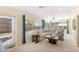 Bright living room with large windows, plush seating, and neutral decor at 218 N Bay Hills Blvd, Safety Harbor, FL 34695