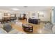 Spacious open floor plan with a cozy living room, dining area and kitchen, creating an inviting atmosphere at 218 N Bay Hills Blvd, Safety Harbor, FL 34695