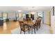 Inviting living room and dining area with hardwood floors, natural light, and stylish furnishings at 218 N Bay Hills Blvd, Safety Harbor, FL 34695