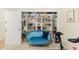 Home office space with a built-in bookshelf and stylish furniture at 218 N Bay Hills Blvd, Safety Harbor, FL 34695