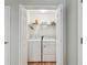 Convenient laundry closet with washer and dryer at 2404 W Jetton Ave, Tampa, FL 33629