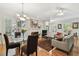 Bright living space boasts a fireplace, hardwood floors, and neutral tones at 2404 W Jetton Ave, Tampa, FL 33629