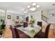 This open layout is bright with a fireplace, hardwood floors, and a staircase at 2404 W Jetton Ave, Tampa, FL 33629