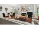 Comfortable living space featuring hardwood floors, fireplace, and natural light at 2404 W Jetton Ave, Tampa, FL 33629
