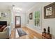 Inviting living room with hardwood floors, plantation shutters, and stylish decor at 2404 W Jetton Ave, Tampa, FL 33629