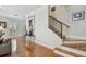 View of the staircase and hardwood floors of this house at 2404 W Jetton Ave, Tampa, FL 33629