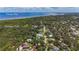 Expansive aerial view of a neighborhood near Tampa Bay and Philippe Park at 2439 Madrid Ave, Safety Harbor, FL 34695