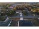 Residential neighborhood featuring a one-story home with a long driveway and lush greenery in a suburban landscape at 270 Planter Rd, Spring Hill, FL 34606