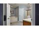 Bathroom featuring a soaking tub, separate shower, and a single vanity with ample lighting at 270 Planter Rd, Spring Hill, FL 34606