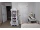Decorated bedroom featuring an antique cabinet and desk at 270 Planter Rd, Spring Hill, FL 34606