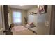 playroom featuring built-in shelves, a plush rug, and soft seating at 270 Planter Rd, Spring Hill, FL 34606
