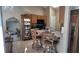 Kitchen area featuring bar stool seating, wooden cabinets, and modern appliances at 270 Planter Rd, Spring Hill, FL 34606