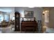 Living room featuring a vintage piano and decor at 270 Planter Rd, Spring Hill, FL 34606