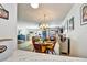 Living room featuring comfortable seating, dining area, and bright interior at 2700 Bayshore Blvd # 544, Dunedin, FL 34698