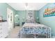 Cozy bedroom with soft natural light, stylish decor, and an ensuite bathroom at 2809 W Platt St # 6, Tampa, FL 33609
