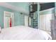 Comfortable main bedroom featuring a spiral staircase, and ample closet space at 2809 W Platt St # 6, Tampa, FL 33609