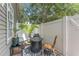 Private outdoor patio features neutral paint colors and stylish furniture at 2809 W Platt St # 6, Tampa, FL 33609