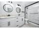 Elegant bathroom featuring double sinks, granite countertops, and a glass-enclosed shower at 2859 38Th N Ave, St Petersburg, FL 33713