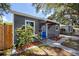 Charming home with gray siding, blue front door, and well-maintained landscaping at 2859 38Th N Ave, St Petersburg, FL 33713