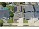 Overhead view of a property featuring solar panels installed on the roof within a vibrant neighborhood setting at 2918 N 21St St, Tampa, FL 33605