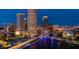 Stunning aerial view of a city skyline with illuminated buildings and a river running through the center at 2918 N 21St St, Tampa, FL 33605