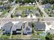 An aerial view showing an organized neighborhood with solar panels visible on a home's roof at 2918 N 21St St, Tampa, FL 33605