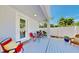 Cozy outdoor patio with comfortable seating, a dining area, and privacy fence, creating a relaxing space at 2918 N 21St St, Tampa, FL 33605
