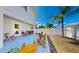 Outdoor patio with a seating area and landscaped backyard, perfect for relaxing and entertaining at 2918 N 21St St, Tampa, FL 33605