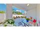 Outdoor patio featuring comfortable seating, a lush backyard, and privacy fencing, ideal for gatherings at 2918 N 21St St, Tampa, FL 33605
