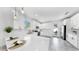 Bright kitchen featuring white cabinets, quartz countertops, modern fixtures and stainless appliances at 2918 N 21St St, Tampa, FL 33605