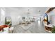Bright, open-concept living area featuring modern decor, sleek flooring, and abundant natural light at 2918 N 21St St, Tampa, FL 33605