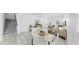 Open-concept living room featuring stylish furniture, decor, and staircase at 2918 N 21St St, Tampa, FL 33605
