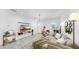 Bright living room featuring modern lighting, tile floors, and stylish decor at 2918 N 21St St, Tampa, FL 33605