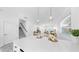 Open-concept space with living room and kitchen area under modern pendant lighting at 2918 N 21St St, Tampa, FL 33605