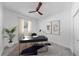 Office space with neutral colors, ceiling fan, modern desk and ample natural light at 2918 N 21St St, Tampa, FL 33605