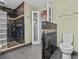 Nicely tiled bathroom features a glass block shower and modern fixtures at 3012 Grand View Ave, Clearwater, FL 33759
