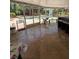 Spacious covered patio with tile flooring and access to the pool area for seamless indoor-outdoor living at 3012 Grand View Ave, Clearwater, FL 33759
