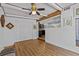 Cozy dining room with laminate floors, ample closet space, and ceiling fan at 3012 Grand View Ave, Clearwater, FL 33759