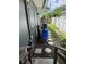 Exterior view of the house with landscaping, stepping stones, and fencing at 3012 Grand View Ave, Clearwater, FL 33759