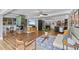 Spacious living room features a modern fireplace, sleek furniture, and hardwood floors at 3012 Grand View Ave, Clearwater, FL 33759