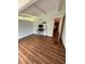 Office space features wood floors, work station, and natural light at 3012 Grand View Ave, Clearwater, FL 33759