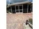 Exterior view of patio area with screened room at 3012 Grand View Ave, Clearwater, FL 33759