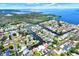 Stunning aerial view of a waterfront community with canals, lush greenery, and scenic water access at 304 Westwinds Dr, Palm Harbor, FL 34683